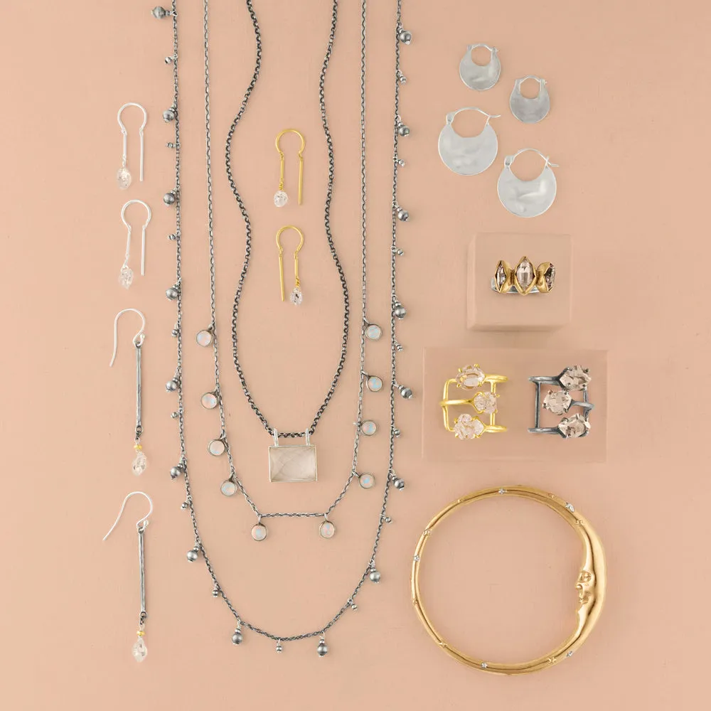 Modern Curve Hoops in Silver